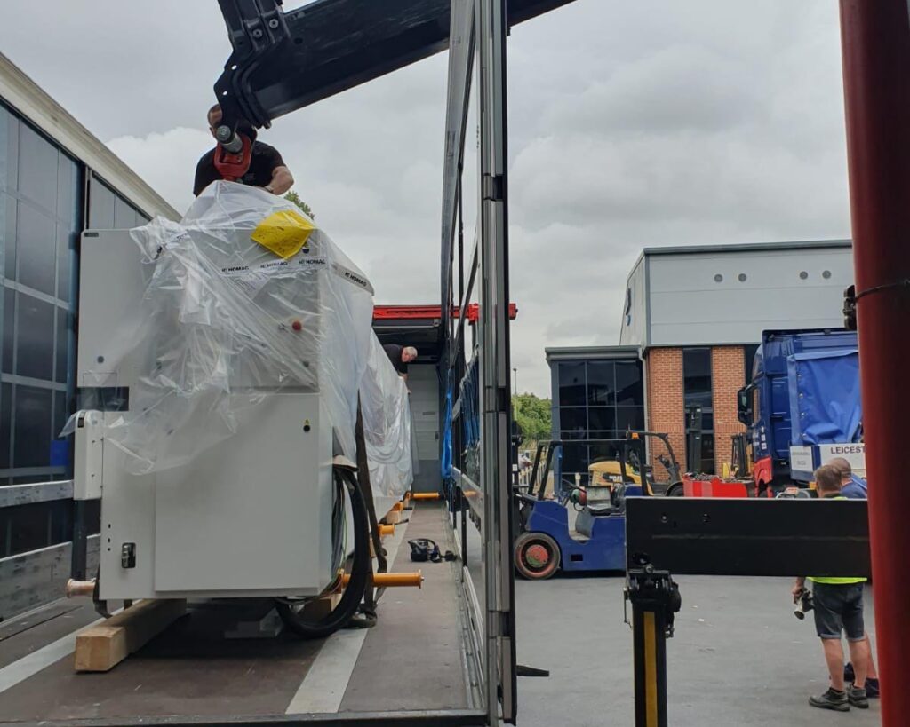 Offloading outside transport with crane vehicle